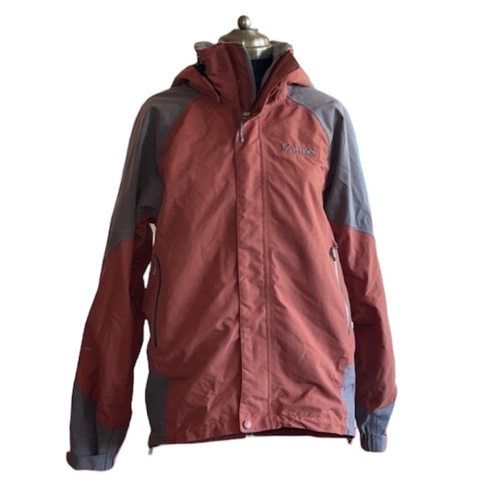 Marmot mens or women’s windbreaker jacket red and grey in color With pockets